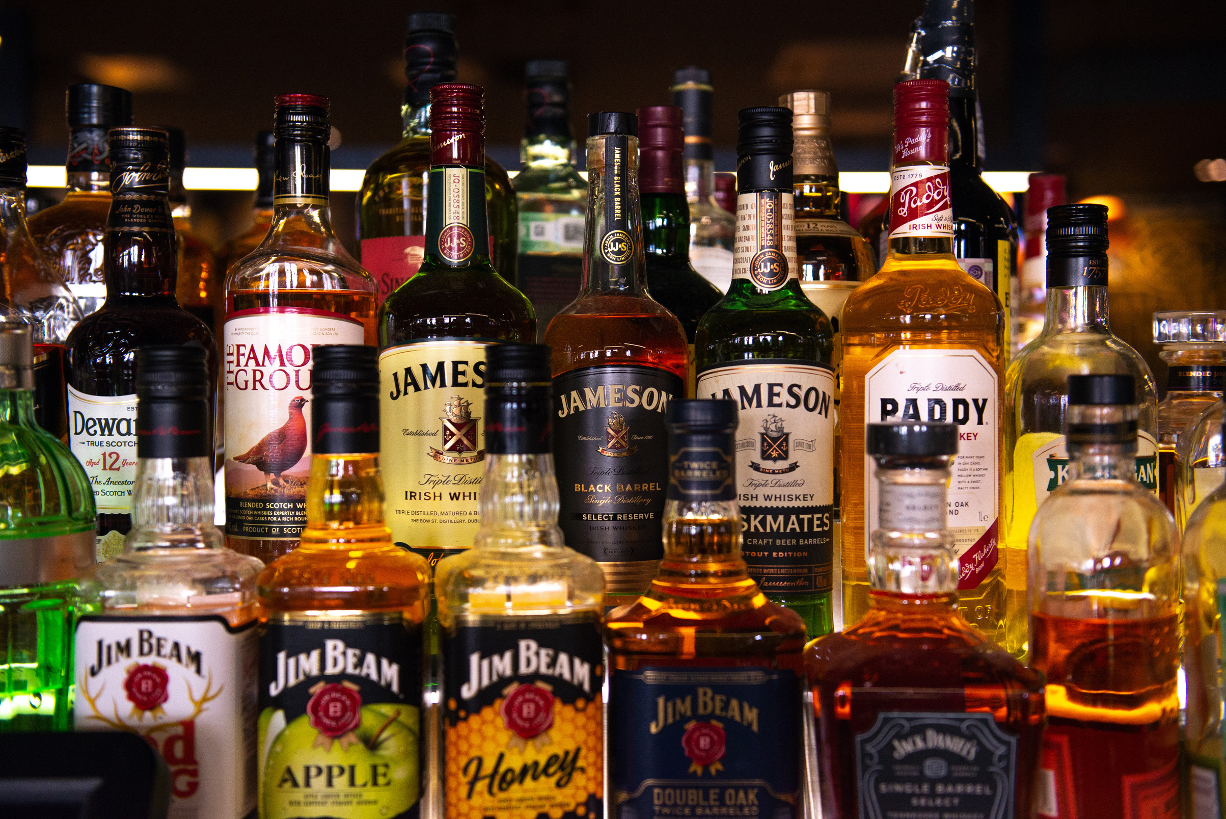 Close-Up Shot of Bottles of Alcoholic Beverages